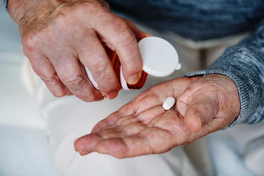 Old People Taking Medicine